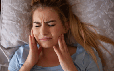 Bruxismo: sintomi, cause e rimedi per proteggere denti e impianti